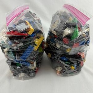 4 lbs Bulk legos with mini figures, horse, and a keychain